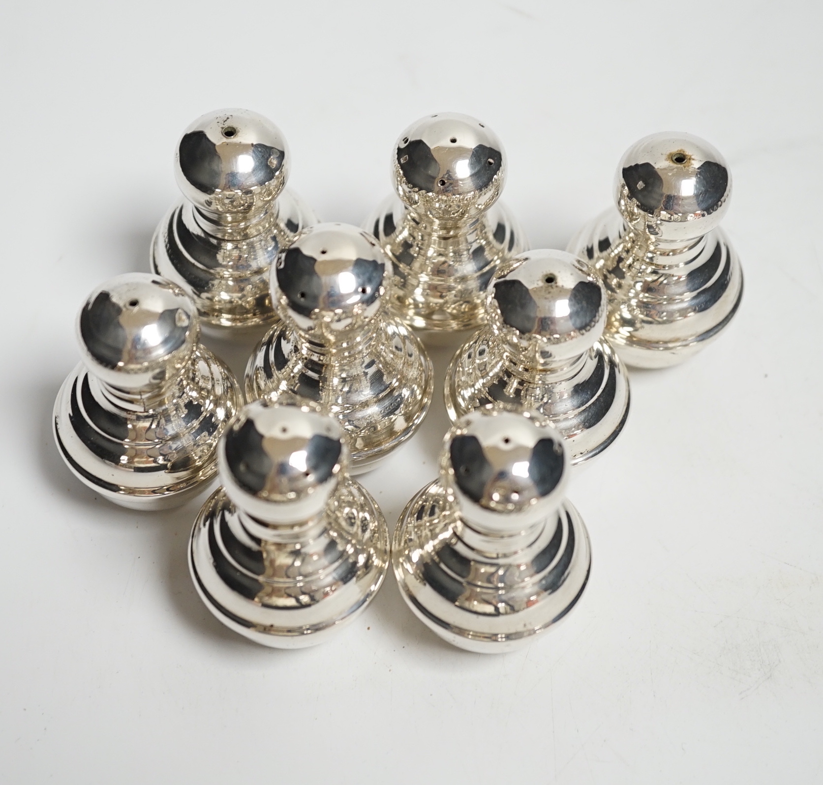 A set of eight 20th century Persian 900 standard white metal salt and pepper condiments, 50mm, 6.4oz.